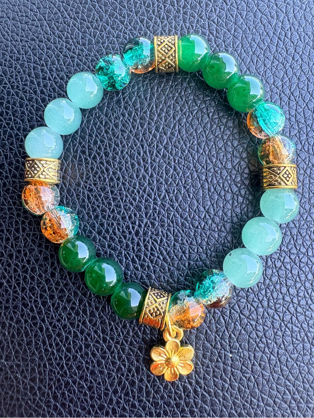 Green and gold accent glass beaded bracelet with flower charm - Picture 1 of 5